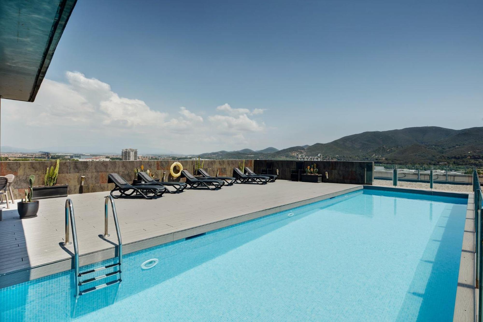 Отель Sercotel Ciutat De 4*